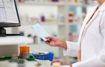 Getty Images-171306993-pharmacist-filling-prescription-resize