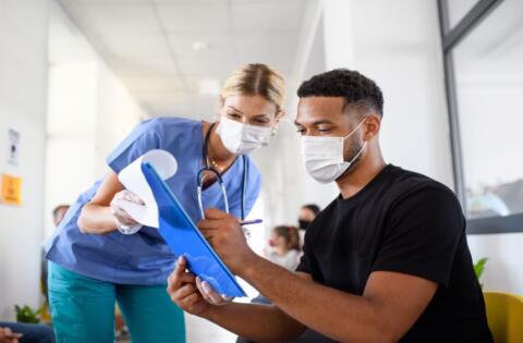 COVID-19 vaccination side effects: how to manage and when to report them