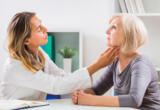 Getty Images-doctor-palpating-womans-neck